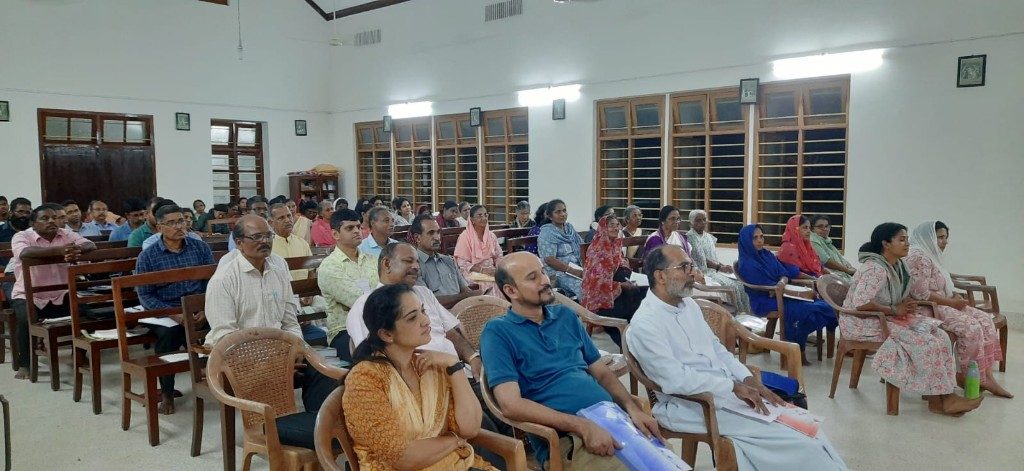 Ayusha Conference 2025 — participants listening during a session